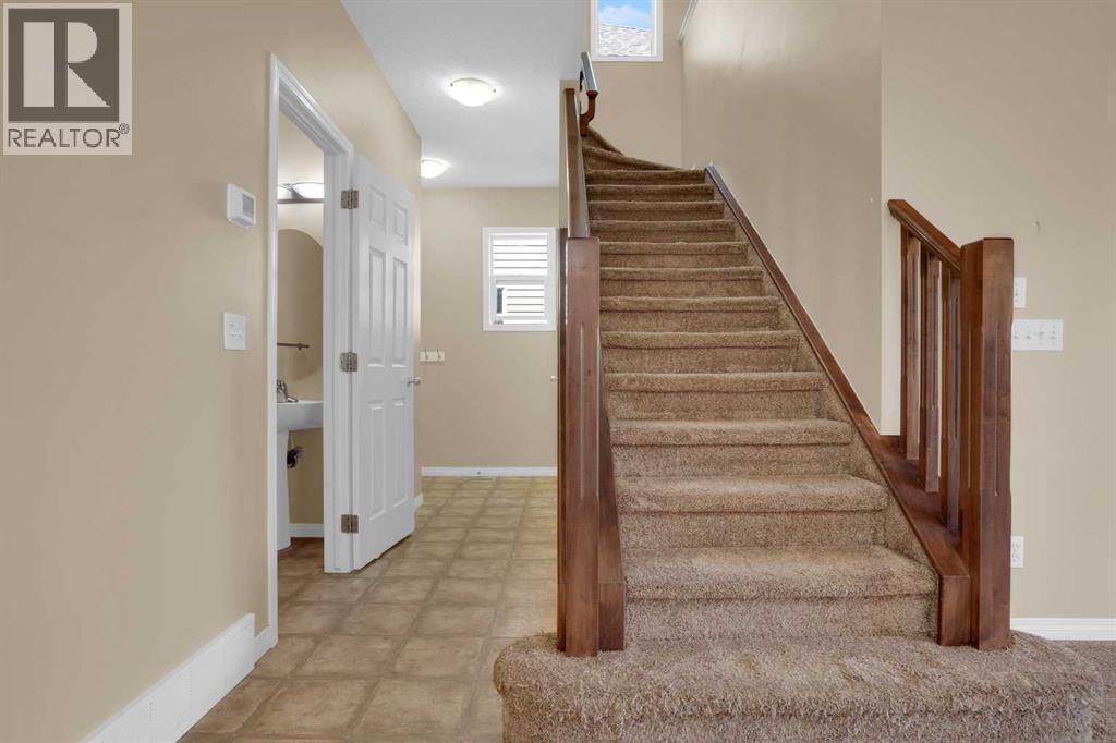 391 Cimarron Boulevard, Okotoks, Alberta  T1S 0A9 - Photo 19 - A2320761