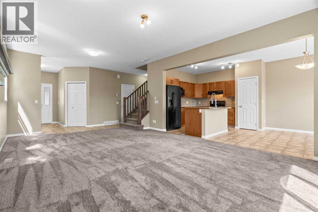 391 Cimarron Boulevard, Okotoks, Alberta  T1S 0A9 - Photo 5 - A2320761