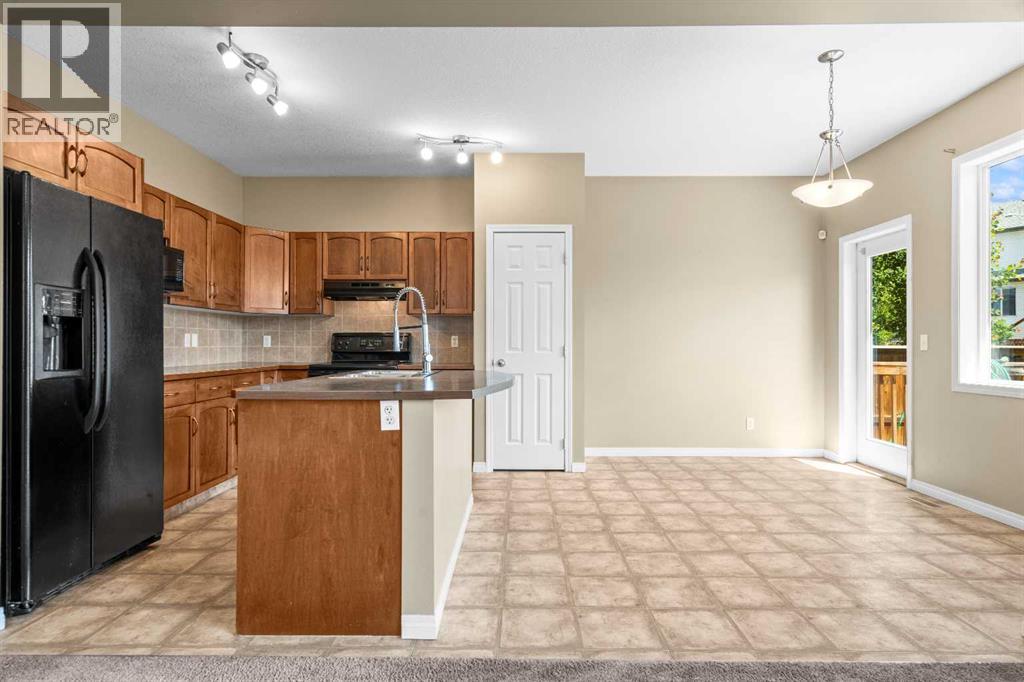 391 Cimarron Boulevard, Okotoks, Alberta  T1S 0A9 - Photo 11 - A2320761