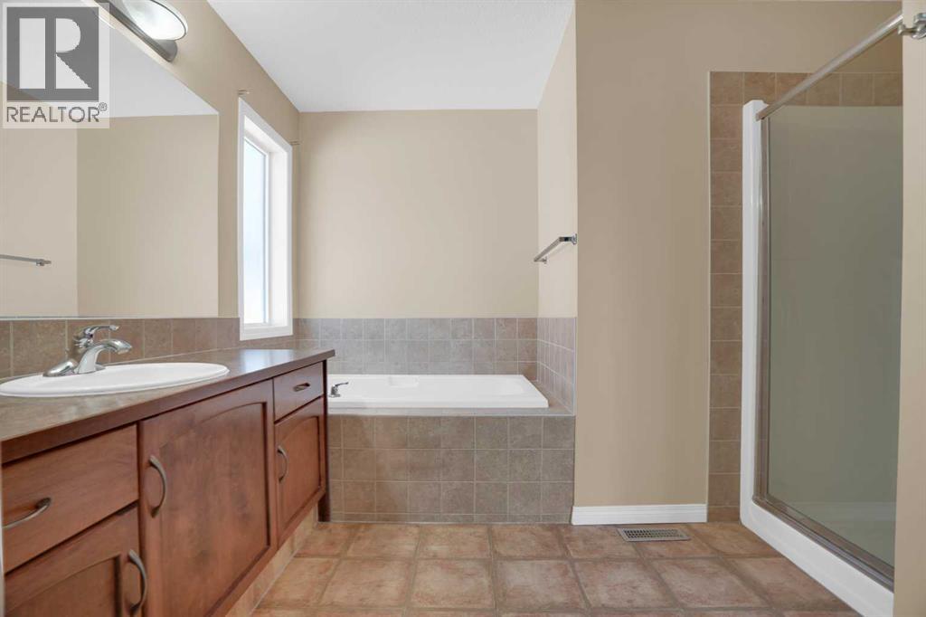391 Cimarron Boulevard, Okotoks, Alberta  T1S 0A9 - Photo 26 - A2320761