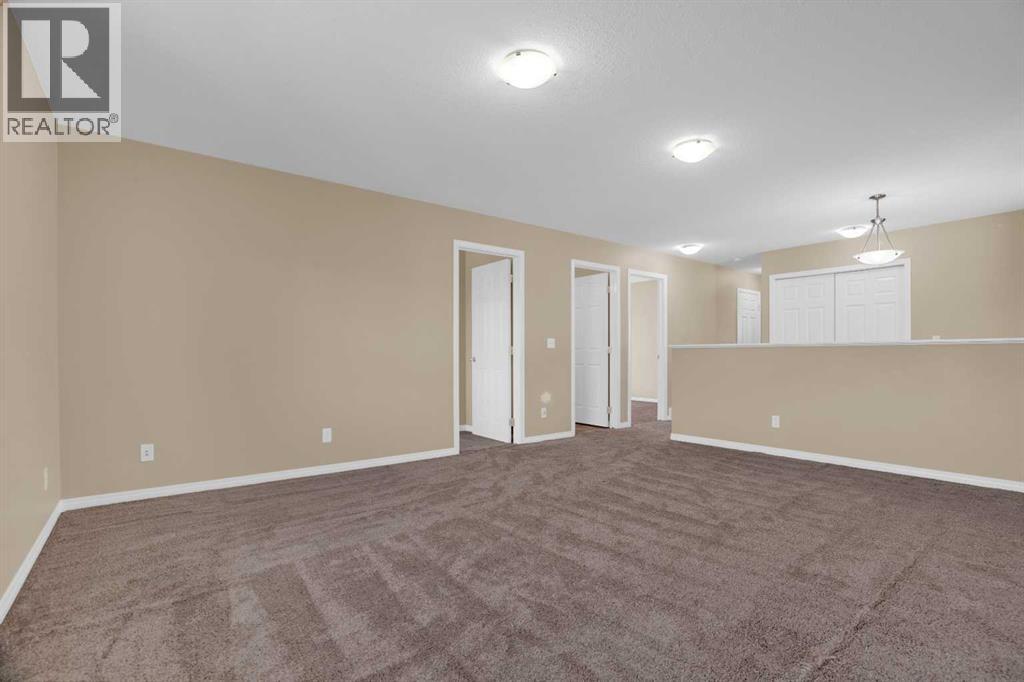 391 Cimarron Boulevard, Okotoks, Alberta  T1S 0A9 - Photo 31 - A2320761