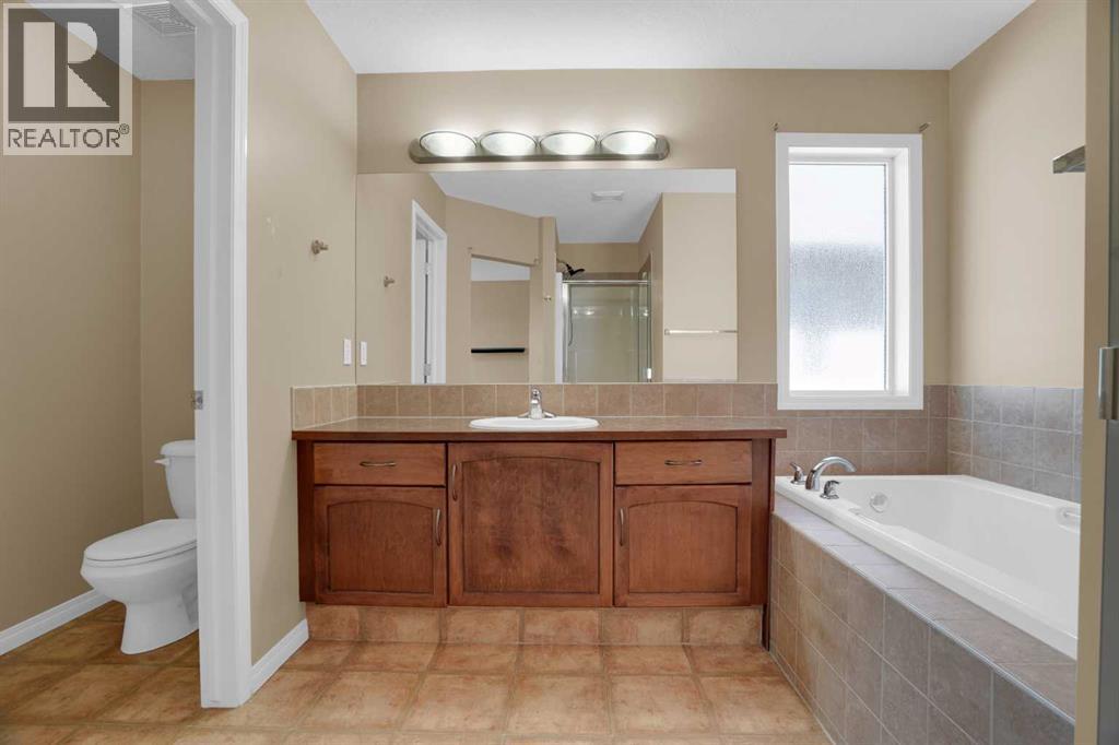 391 Cimarron Boulevard, Okotoks, Alberta  T1S 0A9 - Photo 25 - A2320761
