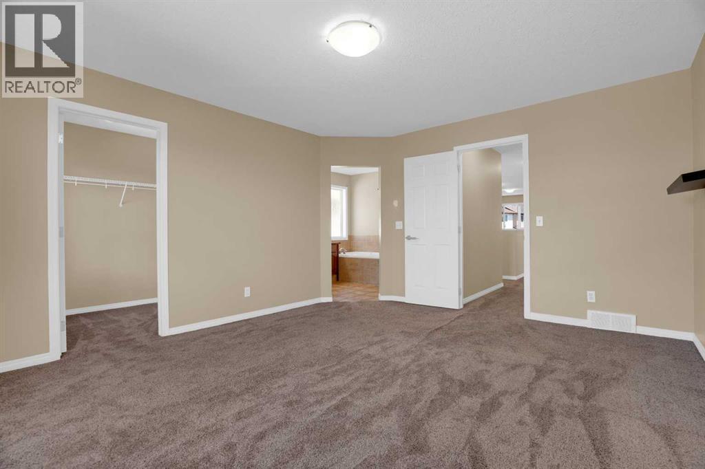 391 Cimarron Boulevard, Okotoks, Alberta  T1S 0A9 - Photo 24 - A2320761