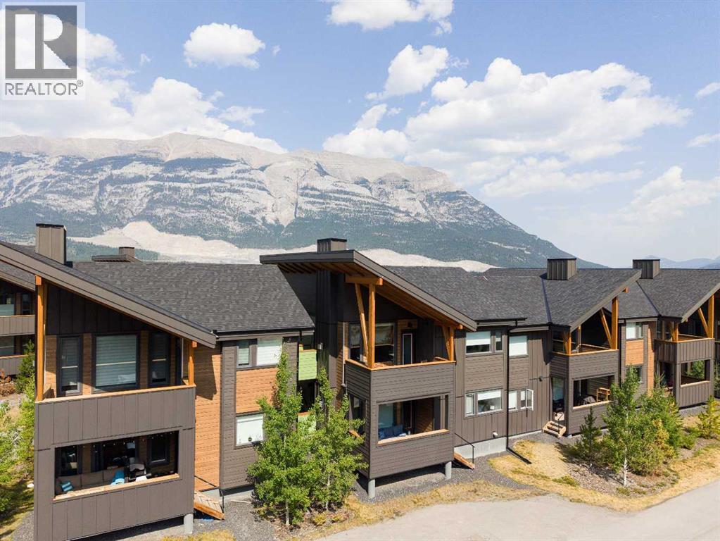 202g, 209 Stewart Creek Rise, Canmore, Alberta  T1W 0N9 - Photo 2 - A2332268