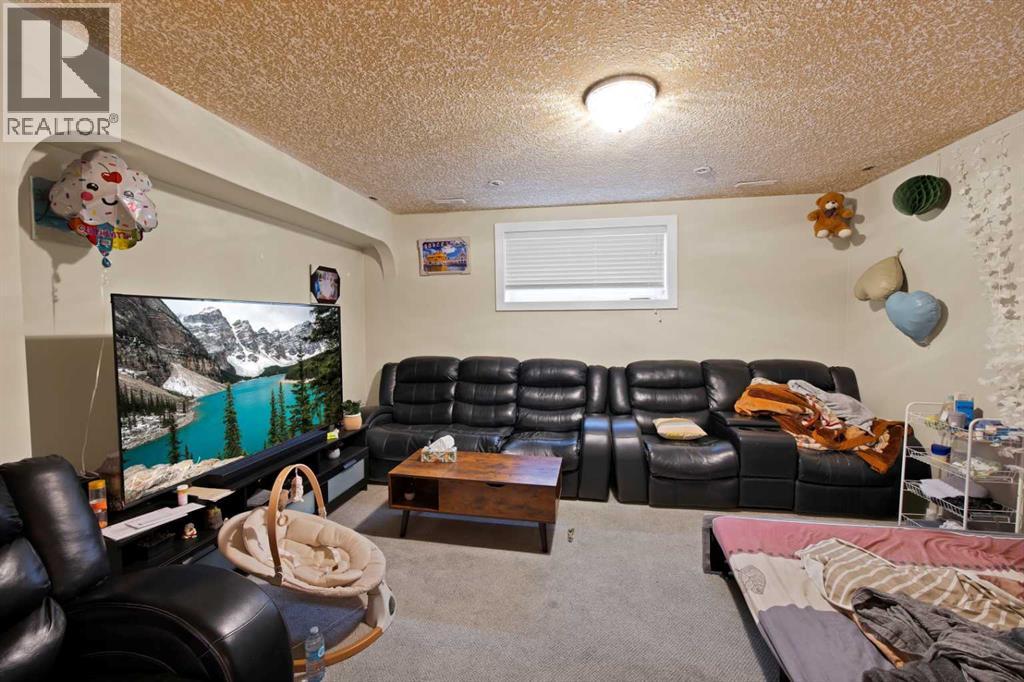 77 Saddleland Drive Ne, Calgary, Alberta  T3J 5J3 - Photo 29 - A2338692