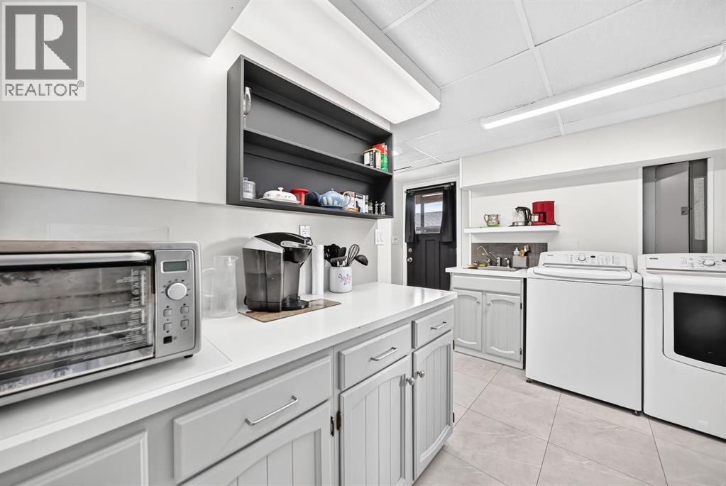 6216 Touchwood Drive NW, Calgary, Alberta  T2K 3L9 - Photo 19 - A2335967