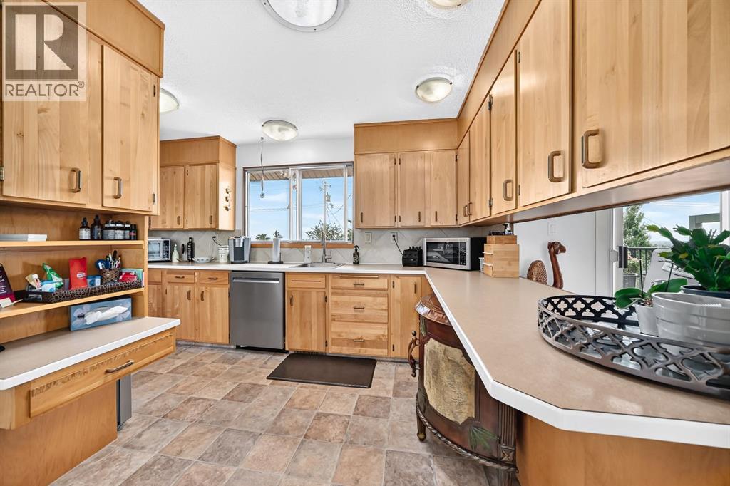6216 Touchwood Drive NW, Calgary, Alberta  T2K 3L9 - Photo 6 - A2335967