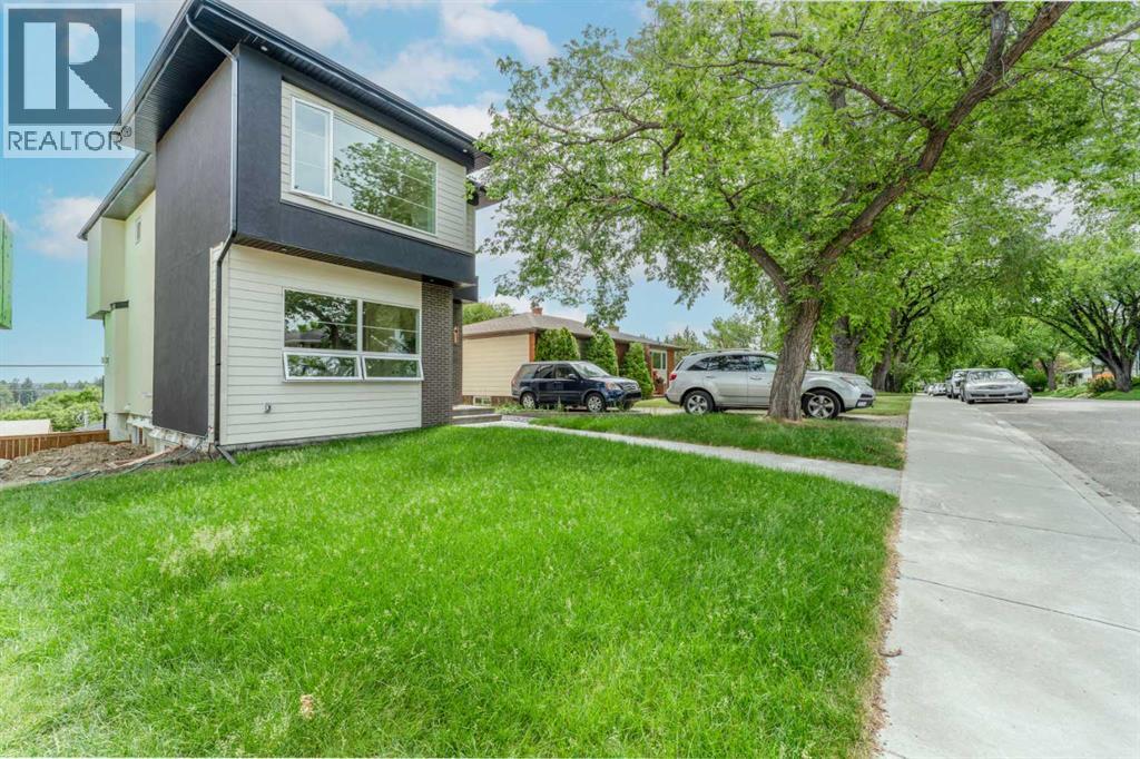 90 Hartford Road NW, Calgary, Alberta  T2K 2A5 - Photo 2 - A2326267