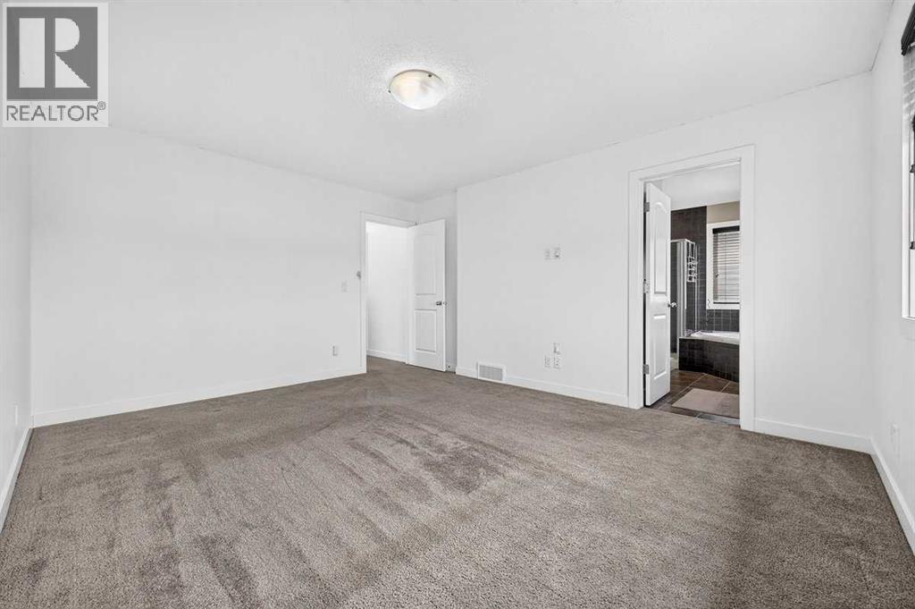 377 Panora Way NW, Calgary, Alberta  T3K 0V2 - Photo 17 - A2335904