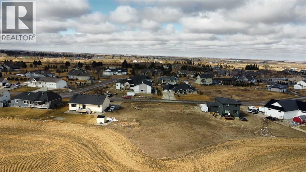 61 Pebble Creek Cove, Raymond, Alberta  T0K 2S0 - Photo 3 - A2260944