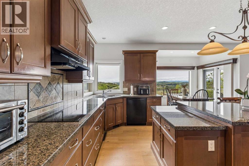 31 Sunset Point, Cochrane, Alberta  T4C 0B3 - Photo 6 - A2318833