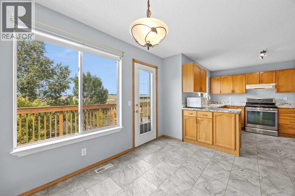 117 Hidden Spring Circle NW, Calgary, Alberta T3A 5H4 - Photo 8 - A2334324