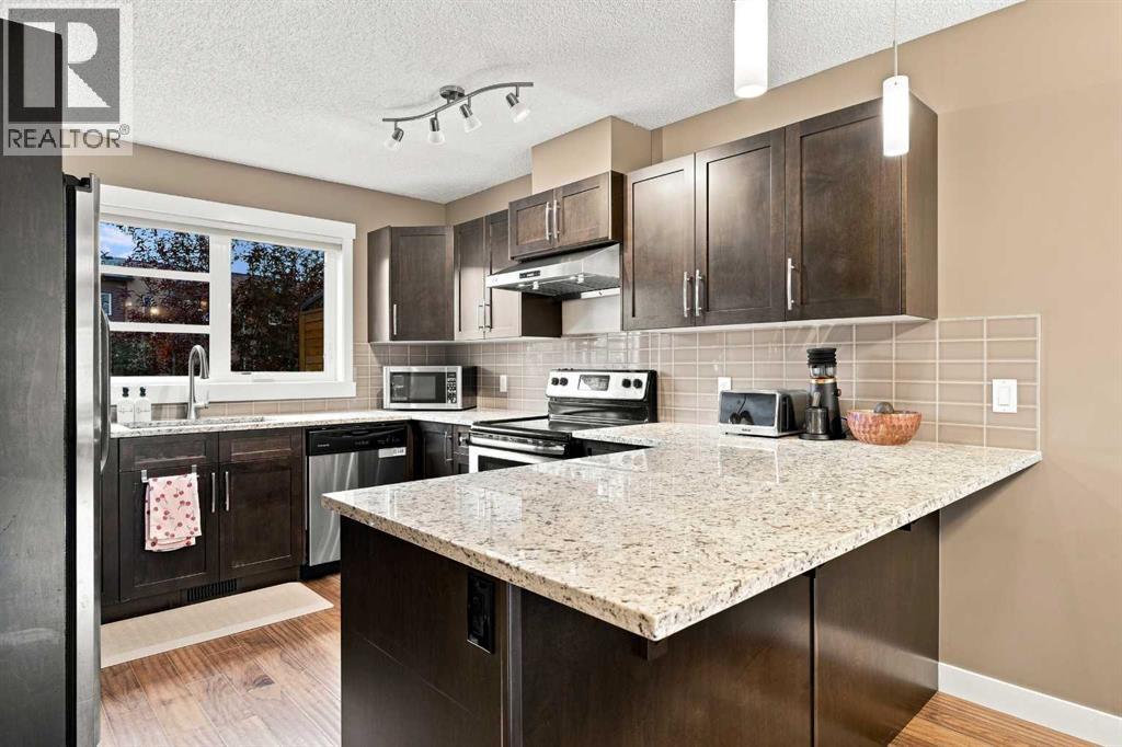231 Covecreek Circle NE, Calgary, Alberta T3K 0W6 - Photo 12 - A2337863