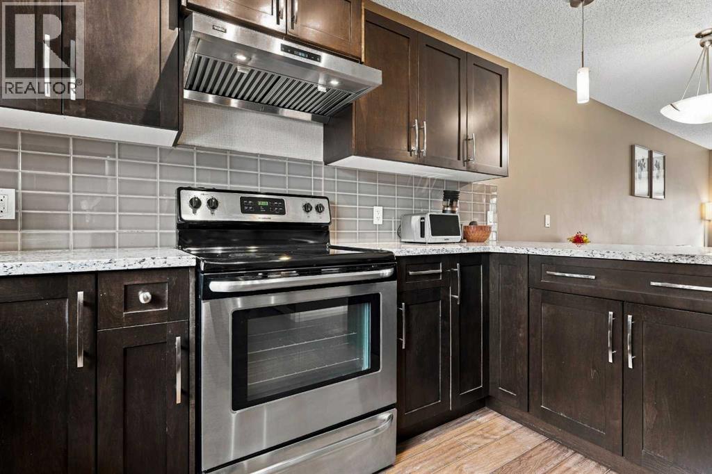 231 Covecreek Circle NE, Calgary, Alberta T3K 0W6 - Photo 13 - A2337863
