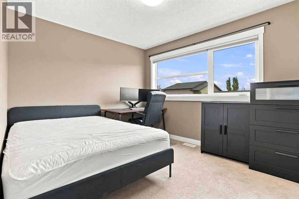231 Covecreek Circle NE, Calgary, Alberta T3K 0W6 - Photo 23 - A2337863