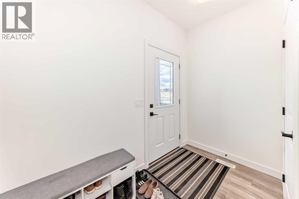 330 Ambleton Drive NW, Calgary, Alberta  T3P 2B7 - Photo 4 - A2337058