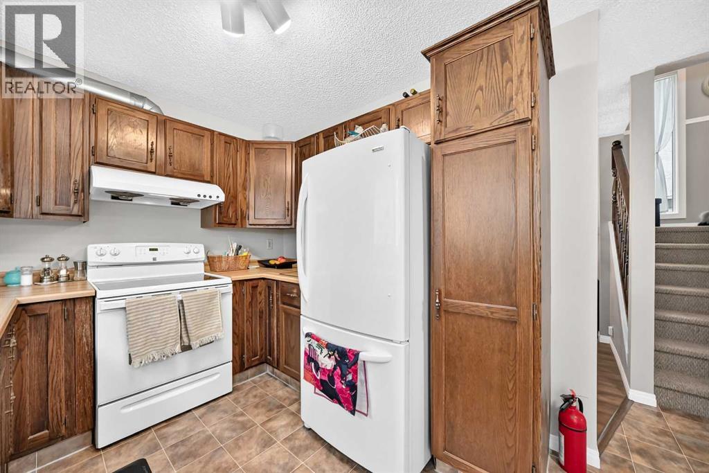 1487 Berkley Drive NW, Calgary, Alberta  T3K 1T7 - Photo 14 - A2337862