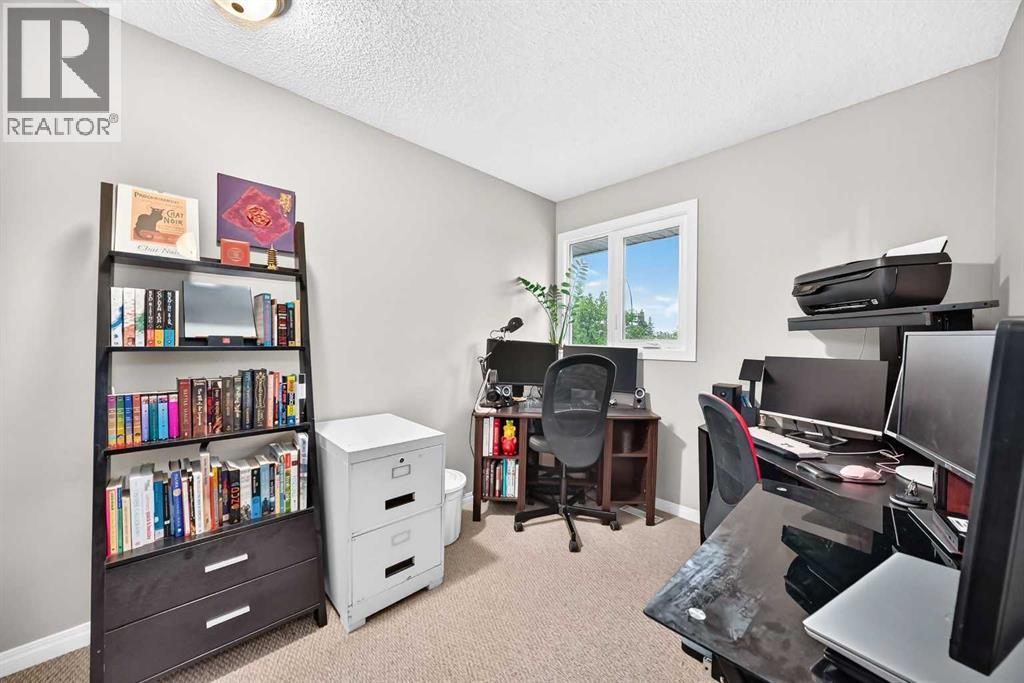 1487 Berkley Drive NW, Calgary, Alberta  T3K 1T7 - Photo 27 - A2337862