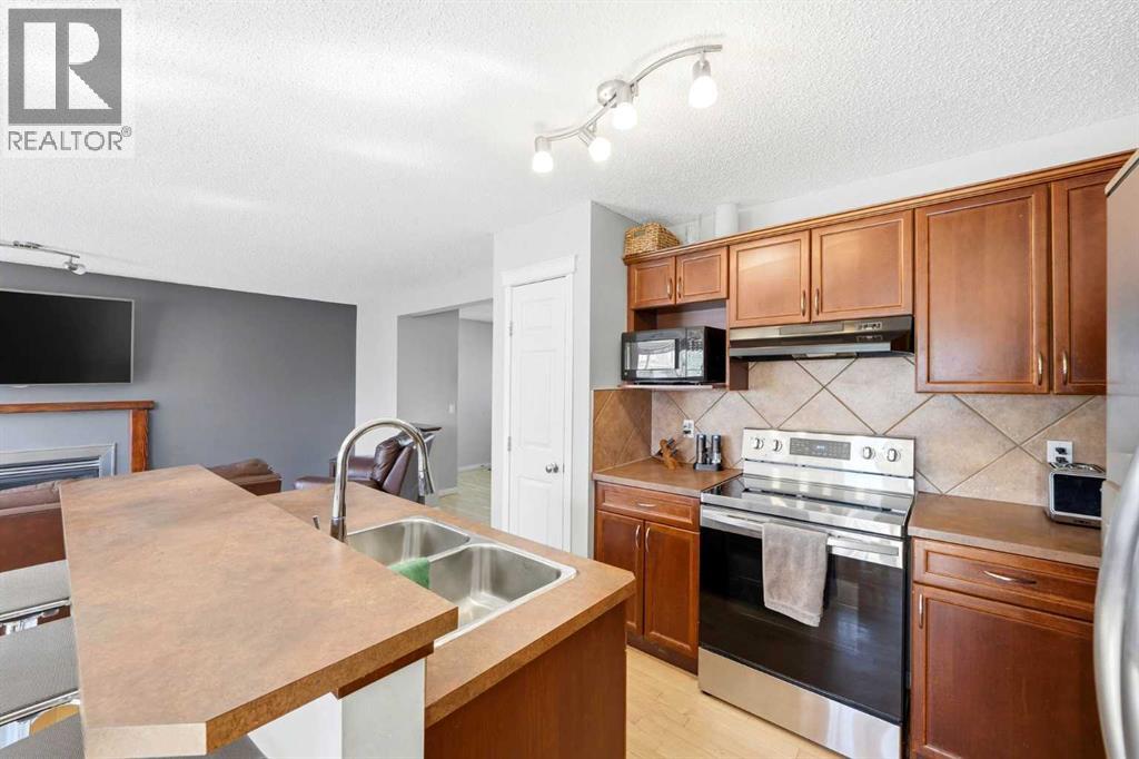 78 Cougar Plateau Way SW, Calgary, Alberta  T3H 5S4 - Photo 11 - A2338830