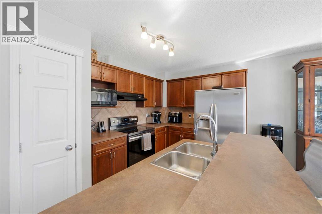 78 Cougar Plateau Way SW, Calgary, Alberta  T3H 5S4 - Photo 12 - A2338830