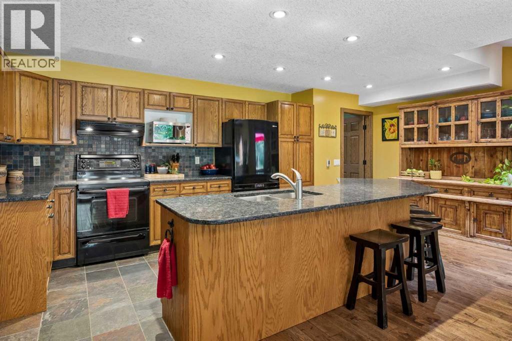226 Mountain Lion Drive, Rural Rocky View County, Alberta  T0L 0K0 - Photo 12 - A2338435