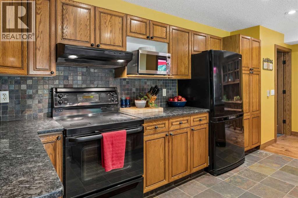 226 Mountain Lion Drive, Rural Rocky View County, Alberta  T0L 0K0 - Photo 13 - A2338435