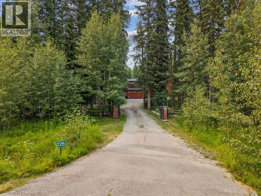 226 Mountain Lion Drive, Rural Rocky View County, Alberta  T0L 0K0 - Photo 2 - A2338435