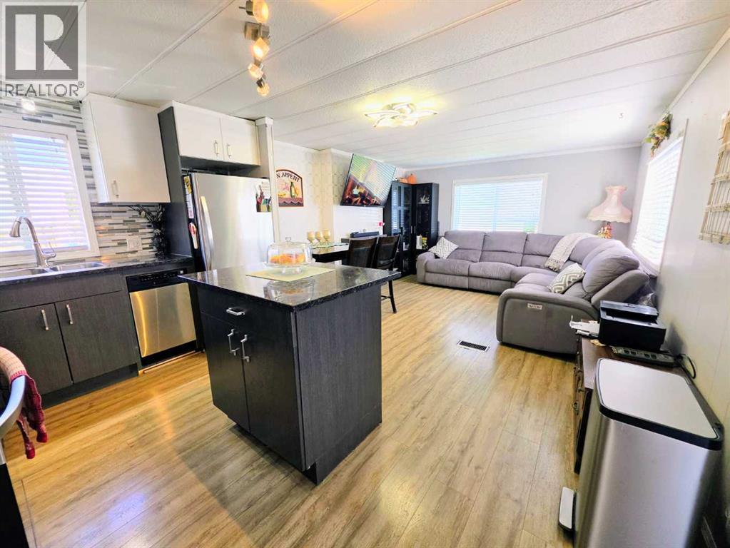 409 7 Avenue, Beaverlodge, Alberta  T0H 0C0 - Photo 4 - A2338293