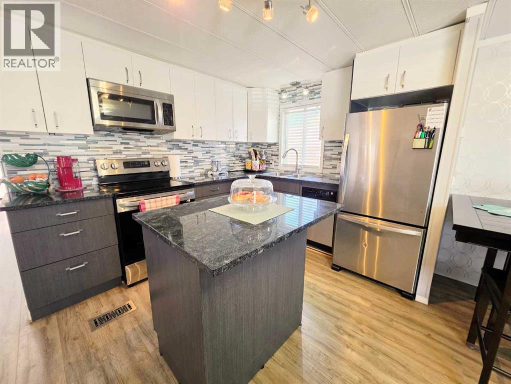 409 7 Avenue, Beaverlodge, Alberta  T0H 0C0 - Photo 8 - A2338293
