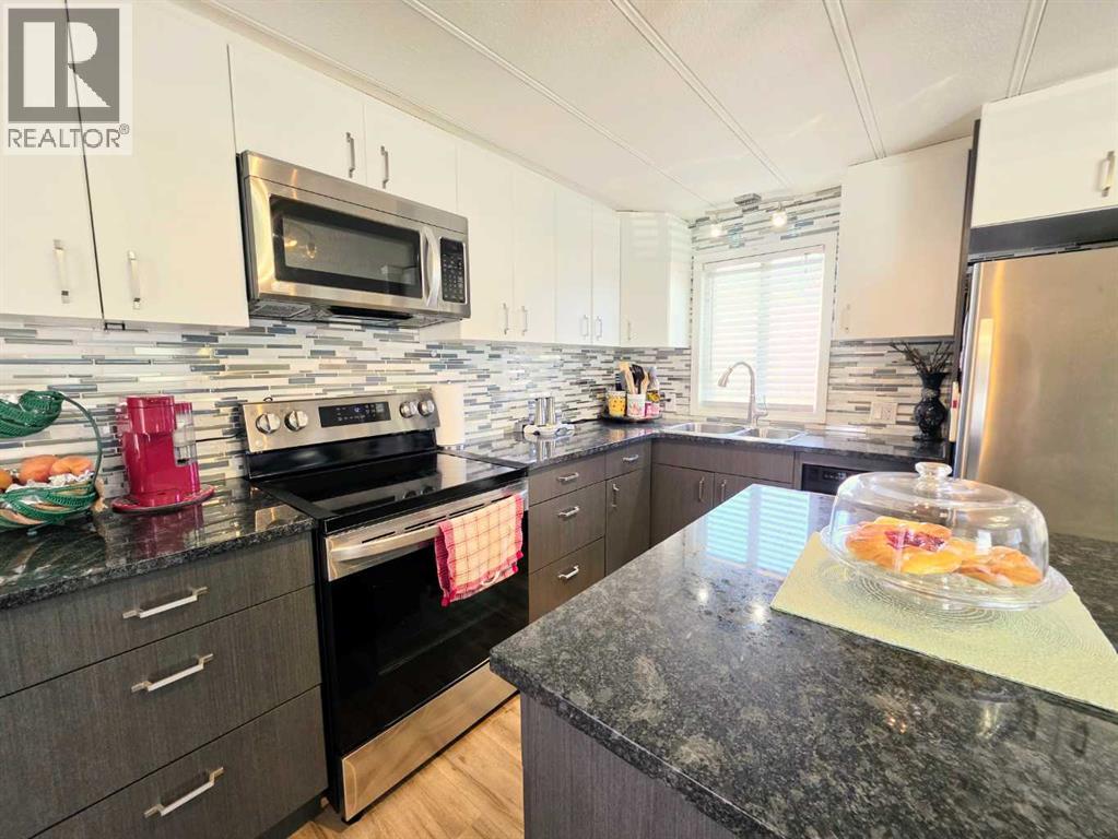 409 7 Avenue, Beaverlodge, Alberta  T0H 0C0 - Photo 9 - A2338293