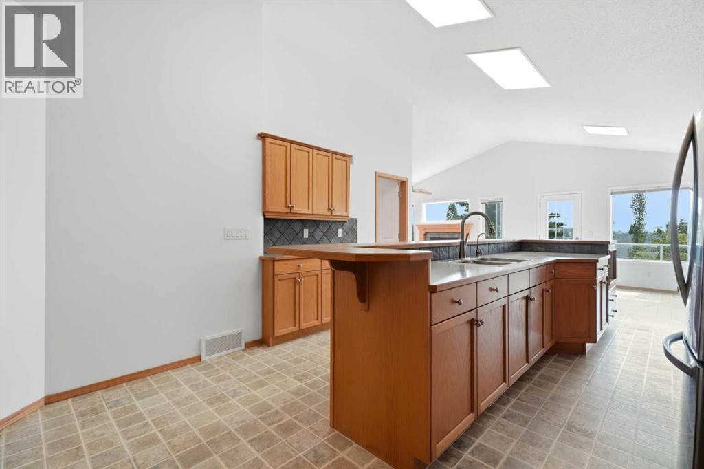 288 Springborough Way Sw, Calgary, Alberta  T3H 5M7 - Photo 3 - A2329269