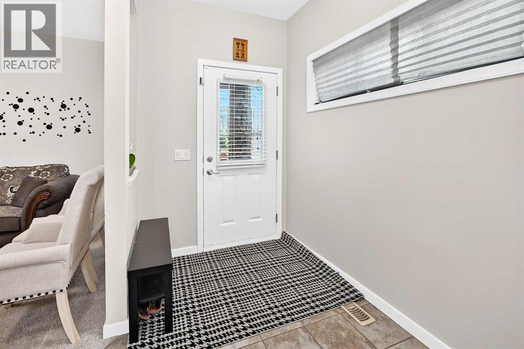 56 Panatella Parade NW, Calgary, Alberta  T3K 0V6 - Photo 4 - A2323033