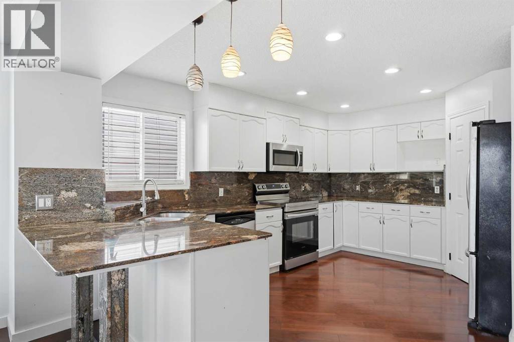 167 Harvest Glen Way NE, Calgary, Alberta  T3K 4J4 - Photo 6 - A2337945