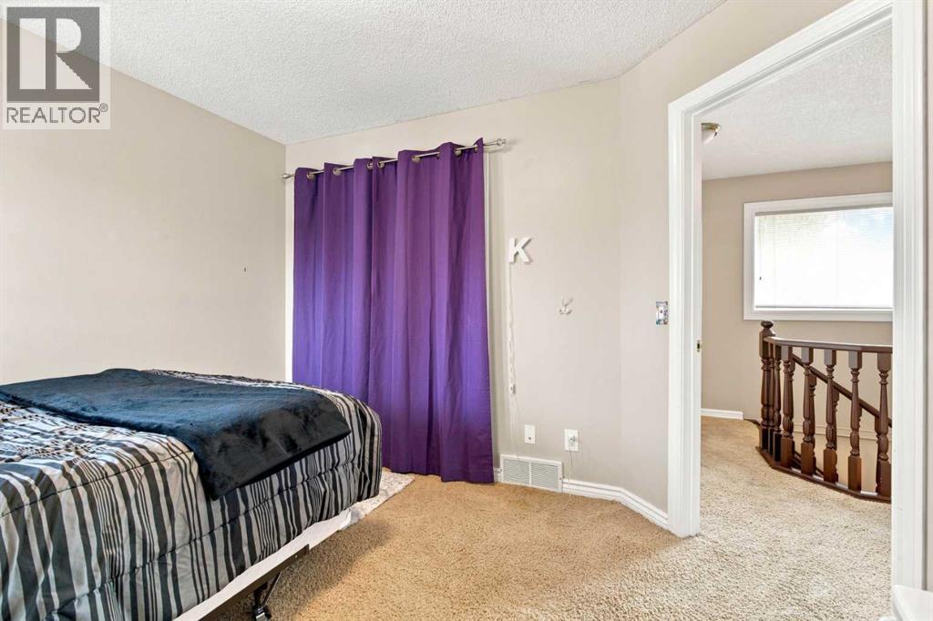 70 Sunset Way SE, Calgary, Alberta  T2X 3C1 - Photo 29 - A2338509