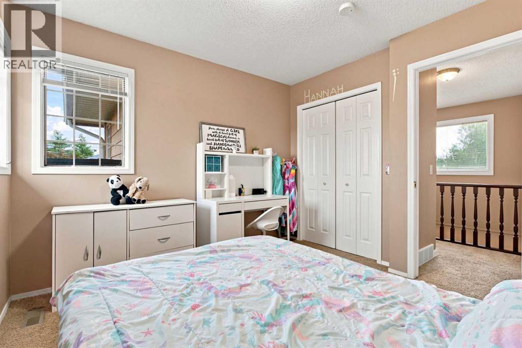 70 Sunset Way SE, Calgary, Alberta  T2X 3C1 - Photo 31 - A2338509