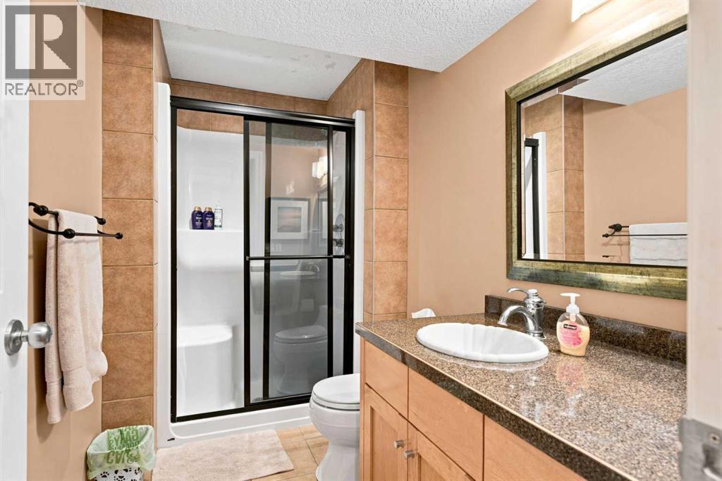 70 Sunset Way SE, Calgary, Alberta  T2X 3C1 - Photo 40 - A2338509