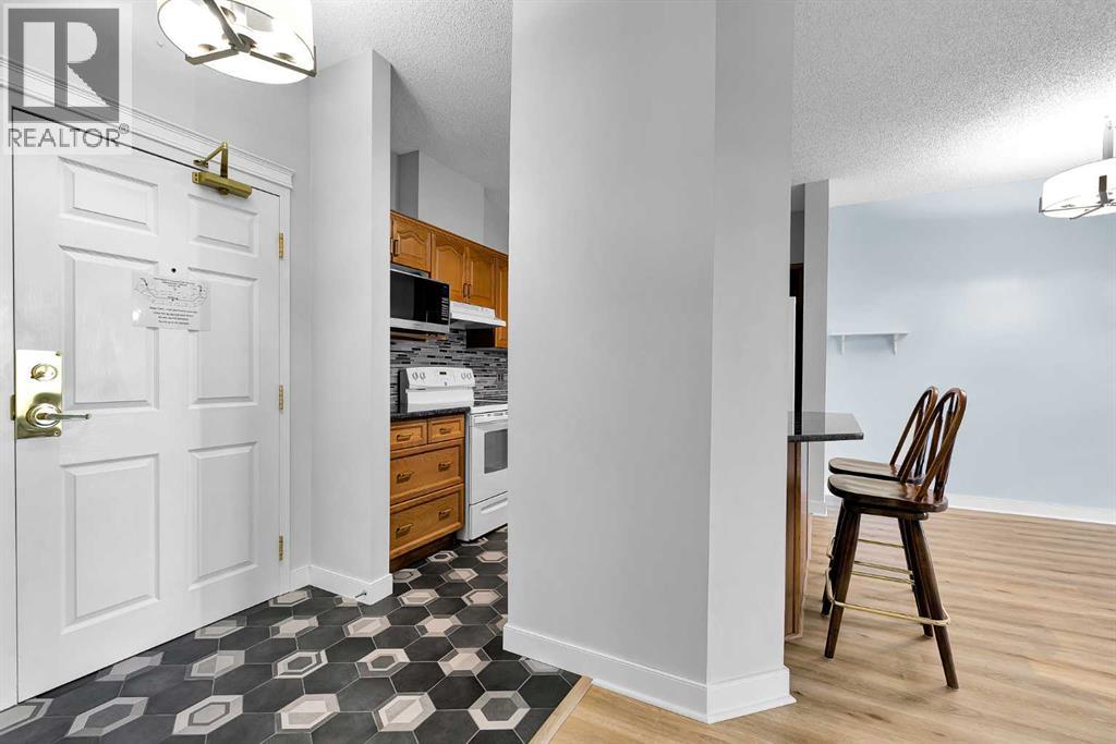 321, 5201 Dalhousie Drive NW, Calgary, Alberta  T3A 5Y7 - Photo 4 - A2329125