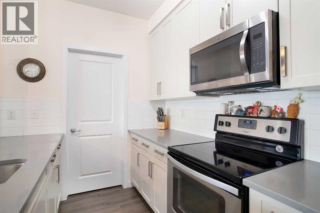 103, 200 Cranfield Common SE, Calgary, Alberta  T3M 1S2 - Photo 4 - A2326497