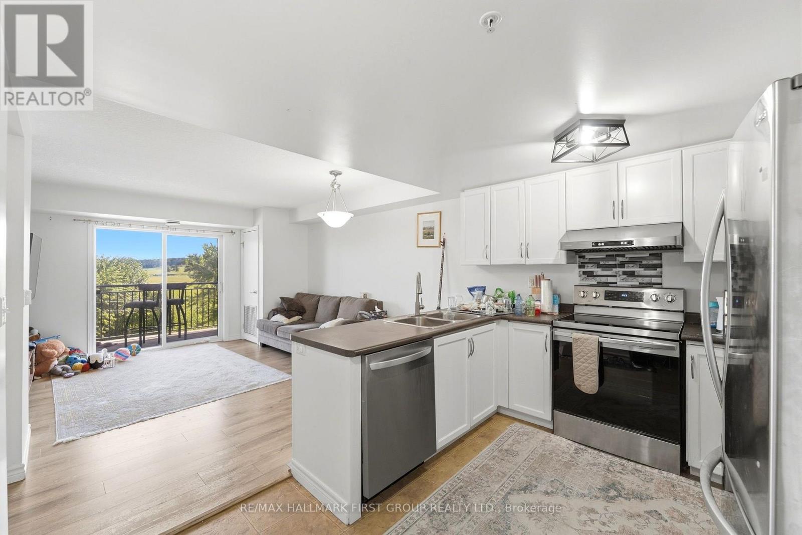 403 - 19 Waterford Drive, Guelph, Ontario  N1L 0J1 - Photo 4 - X13696112