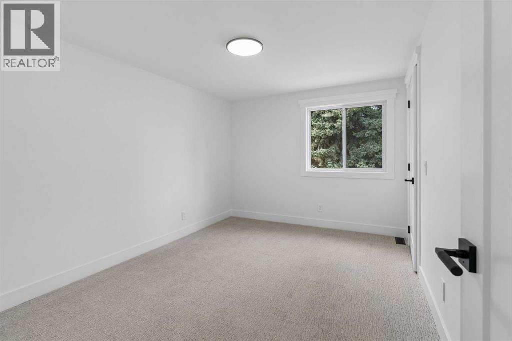 111 Canata Close SW, Calgary, Alberta  T2W 1P8 - Photo 27 - A2329814