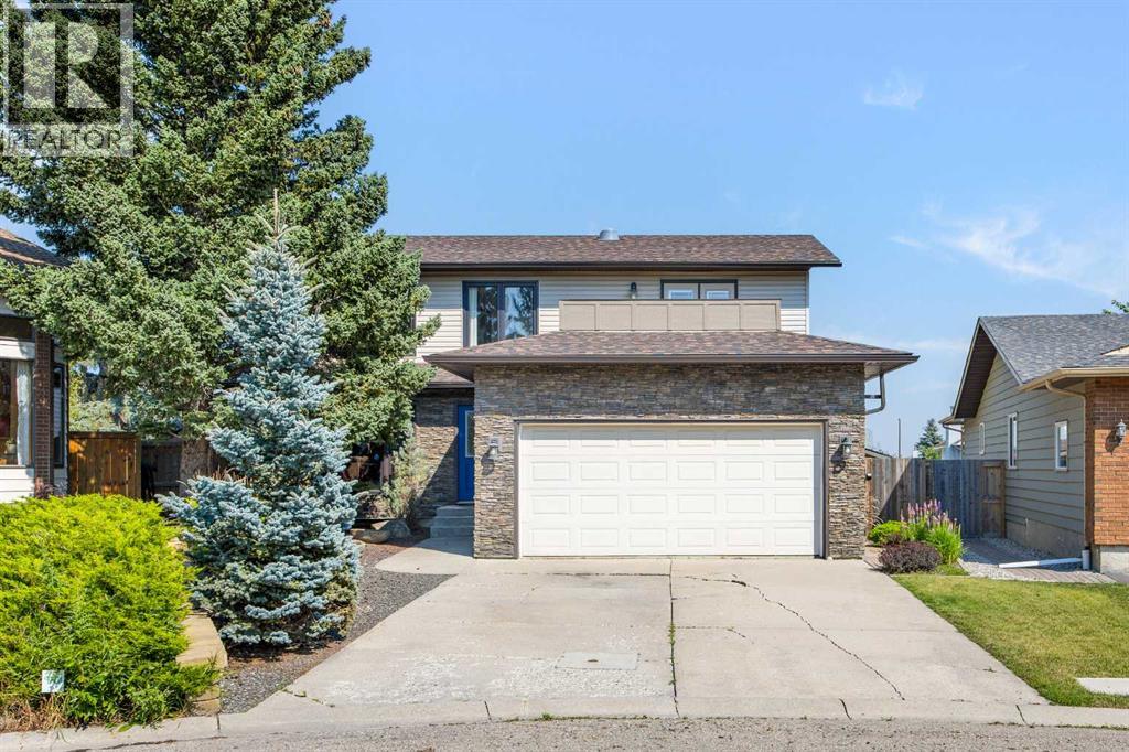 8 Millside Court SW, Calgary, Alberta  T2Y 2P5 - Photo 1 - A2338338