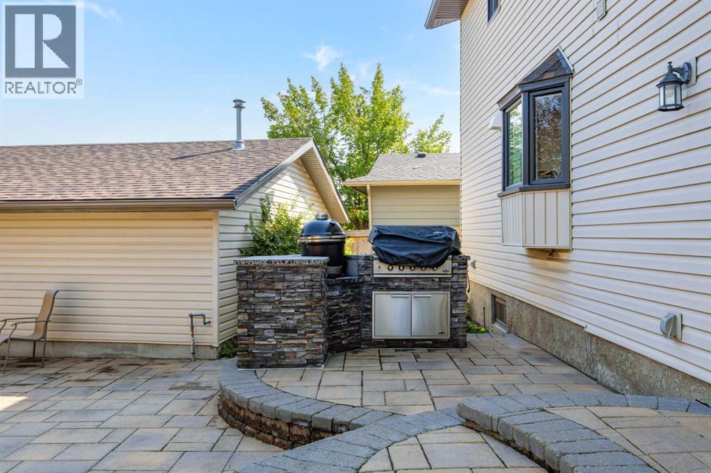 8 Millside Court SW, Calgary, Alberta  T2Y 2P5 - Photo 11 - A2338338