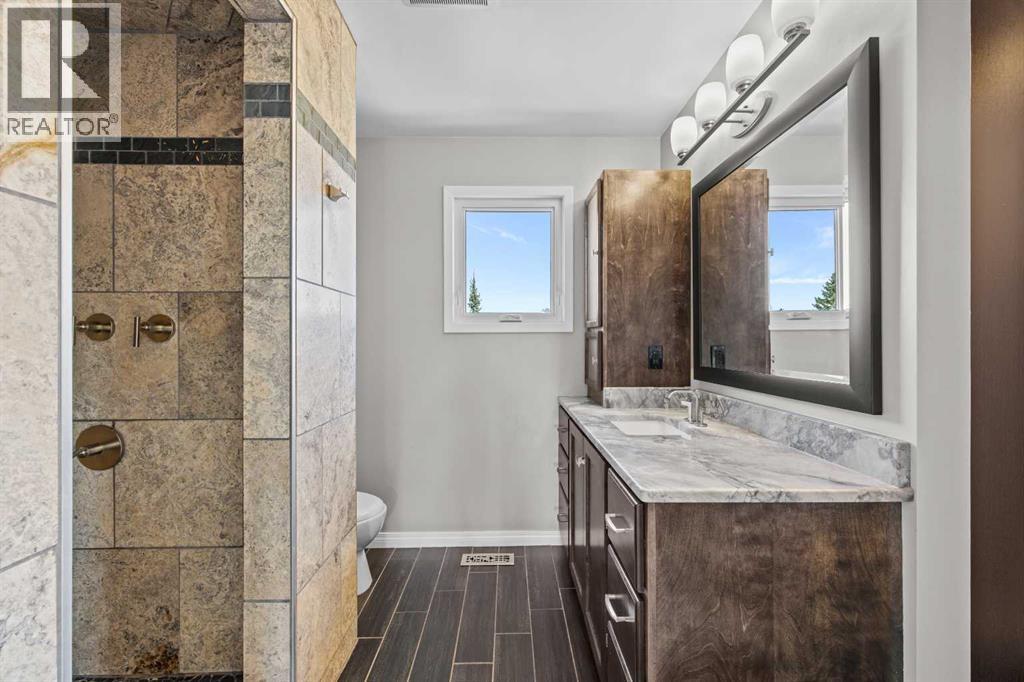 8 Millside Court SW, Calgary, Alberta  T2Y 2P5 - Photo 35 - A2338338