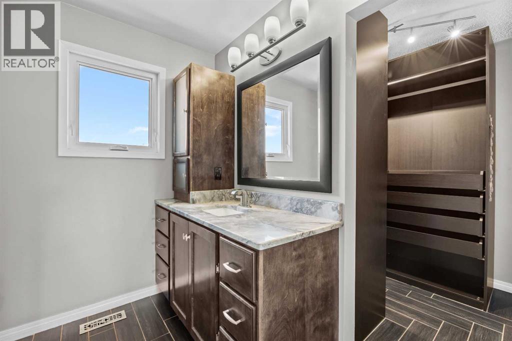 8 Millside Court SW, Calgary, Alberta  T2Y 2P5 - Photo 36 - A2338338