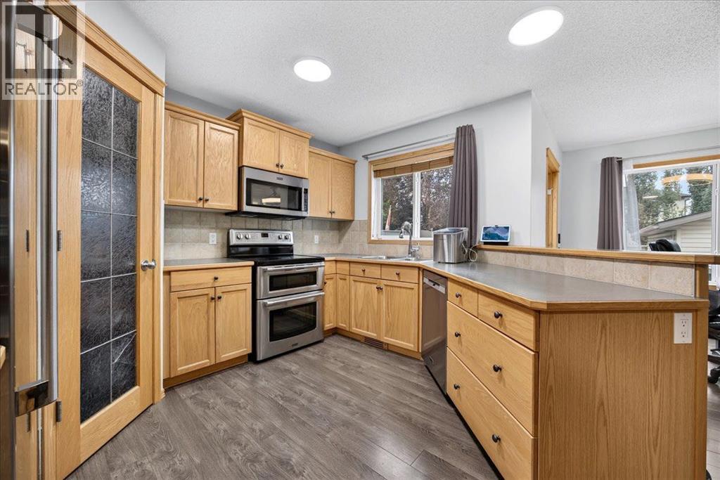 2745 Coopers Manor SW, Airdrie, Alberta  T4B 3J8 - Photo 12 - A2336267