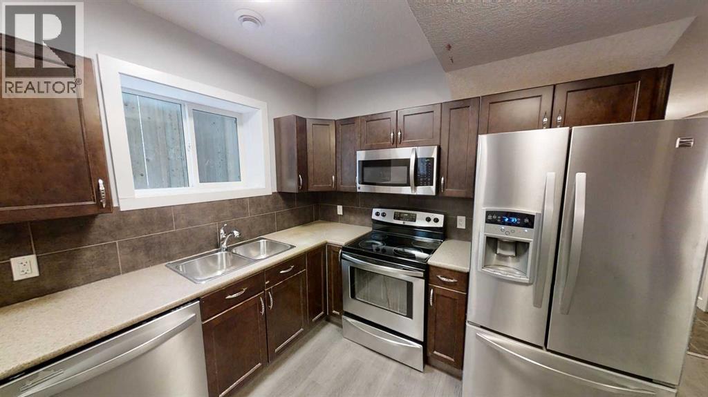 A, 8634 88b Street, Grande Prairie, Alberta  T8X 0P3 - Photo 3 - A2338959