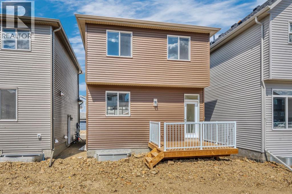 244 Marmot Grove NW, Calgary, Alberta  T3R 2J5 - Photo 4 - A2320973