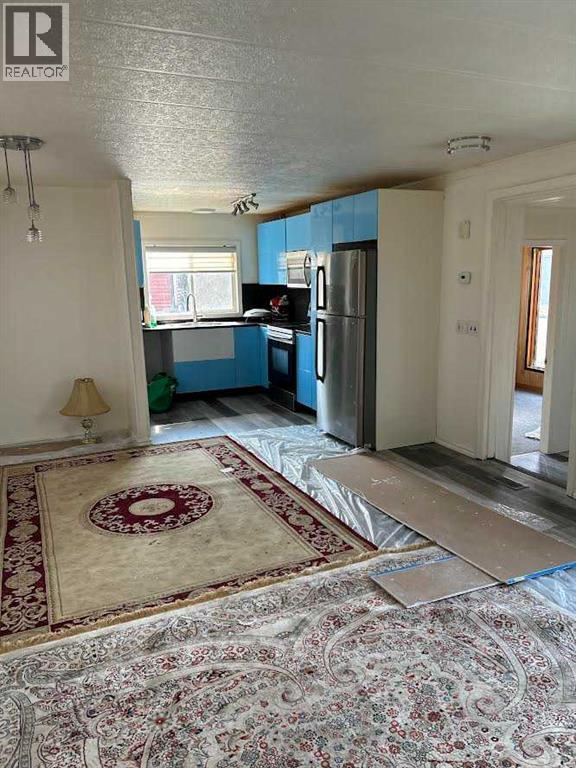 70 Manor Park Crescent E, Brooks, Alberta  T1R 0P5 - Photo 9 - A2338875
