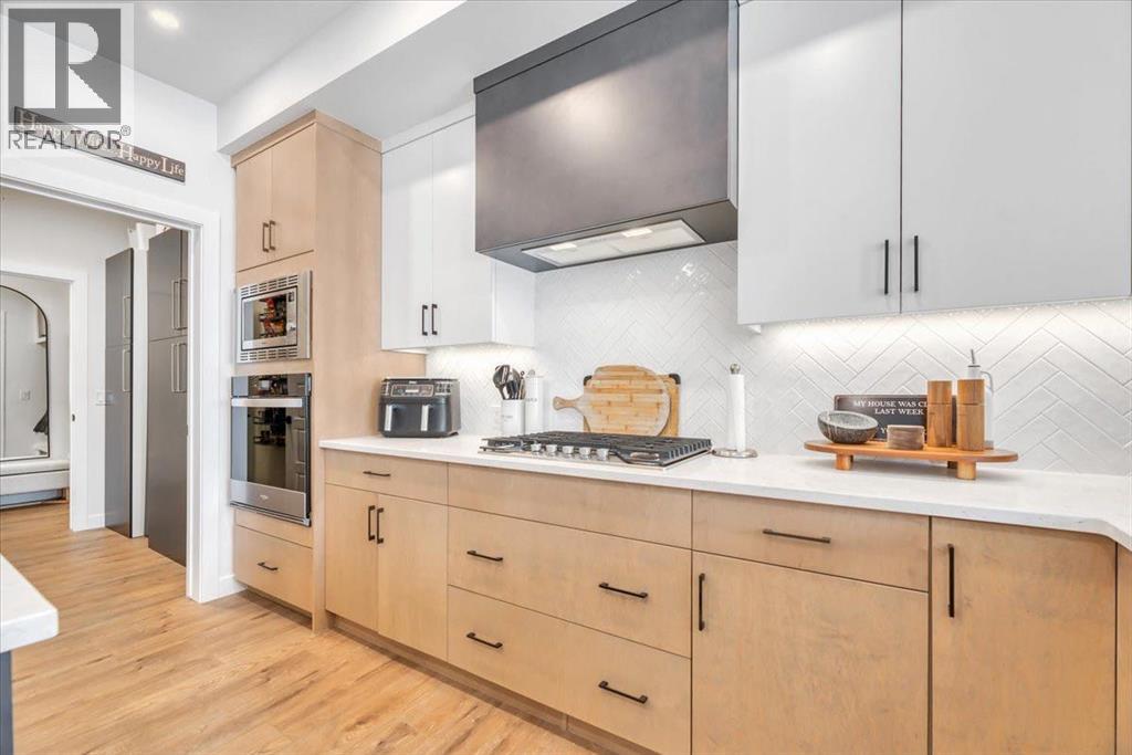 77 Versant Point SW, Calgary, Alberta T2Z 0Z5 - Photo 11 - A2333907