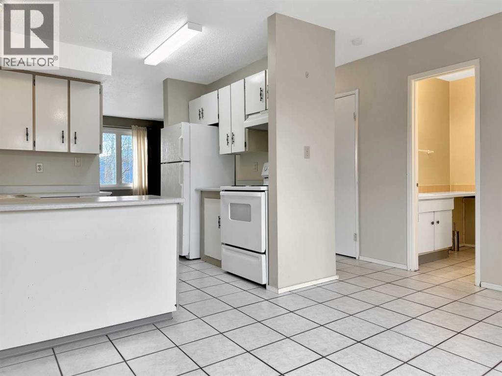 57 97 Avenue, Grande Cache, Alberta t0e 0y0 - Photo 4 - A2325056